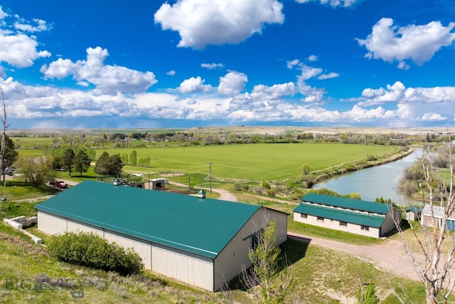 drone / aerial view featuring a rural view and a water view