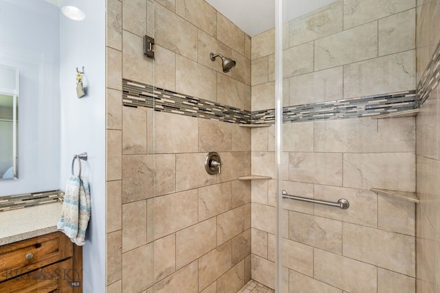 bathroom with a tile shower