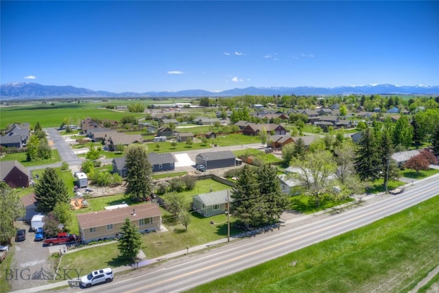 drone / aerial view featuring a mountain view