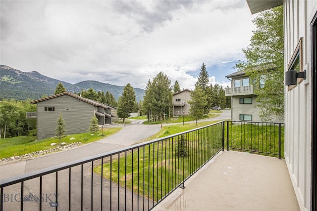 balcony featuring a mountain view