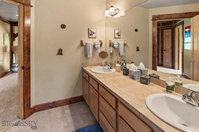 201 Silver Run Rd, Gallatin Gateway, MT 59730 - bathroom featuring baseboards and double vanity
