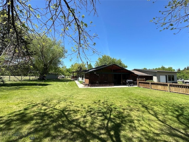 view of yard featuring fence