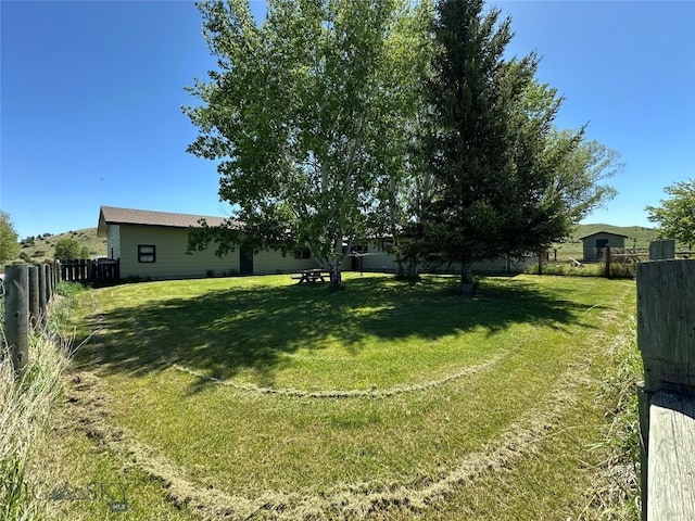 view of yard featuring fence
