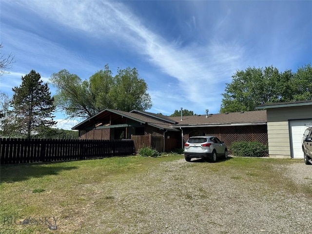 view of front of home with fence