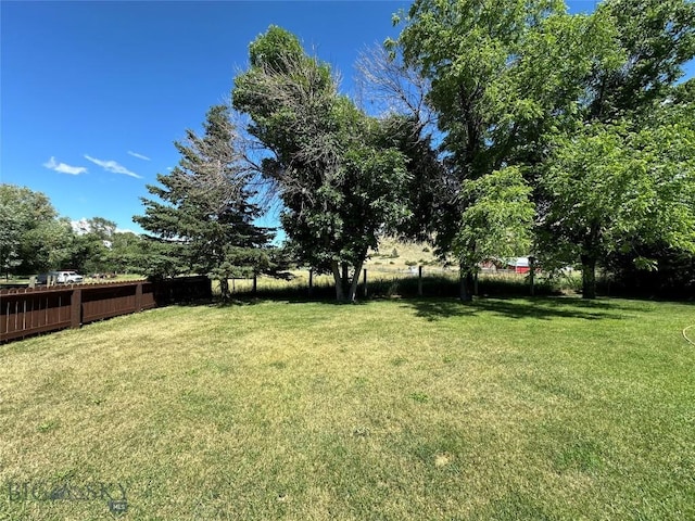 view of yard with fence