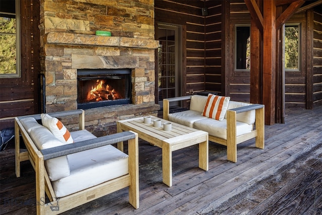 exterior space featuring an outdoor living space with a fireplace