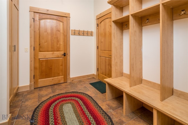 mudroom with tile flooring