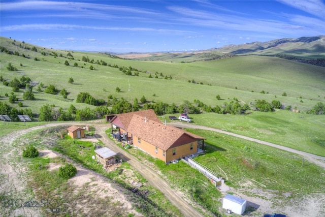 birds eye view of property featuring a rural view