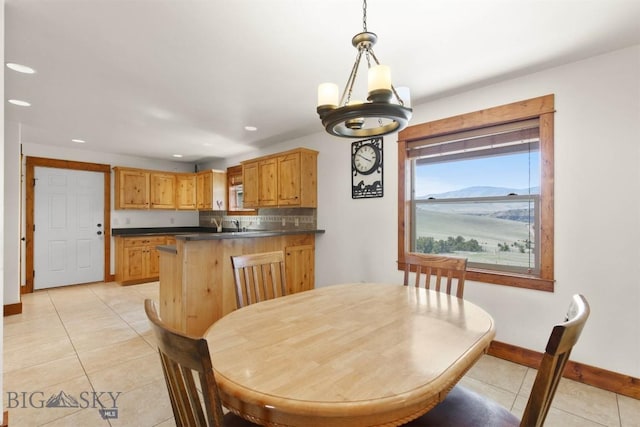 820 Miller Canyon Rd, Three Forks, MT 59752 - dining area with light tile patterned flooring, recessed lighting, baseboards, and a chandelier