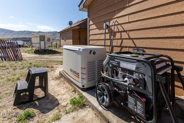 820 Miller Canyon Rd, Three Forks, MT 59752 - exterior view of a power unit, a mountainous background, and a satellite dish