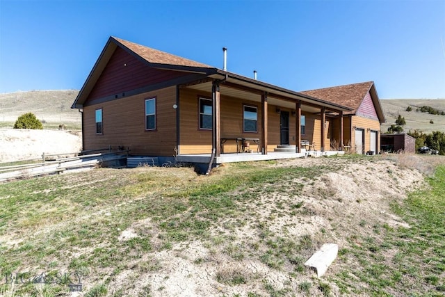 820 Miller Canyon Rd, Three Forks, MT 59752 - back of property with a porch and a garage