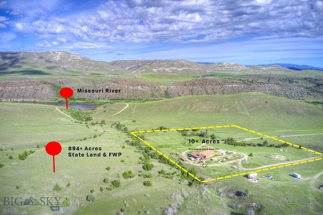 820 Miller Canyon Rd, Three Forks, MT 59752 - aerial view of sparsely populated area with a mountainous background and property parcel outlined