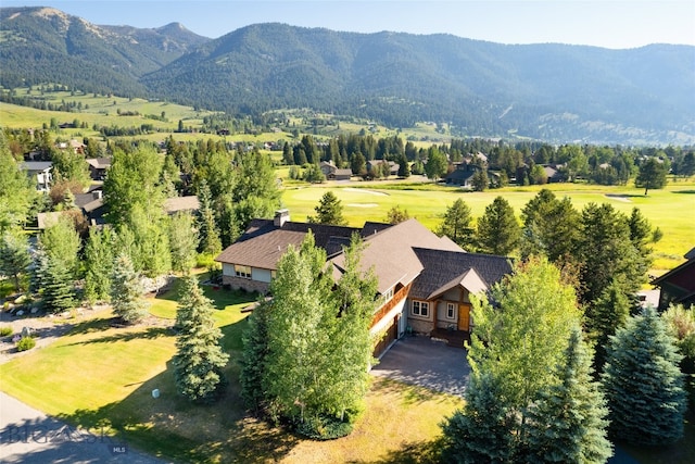 birds eye view of property featuring a mountain view