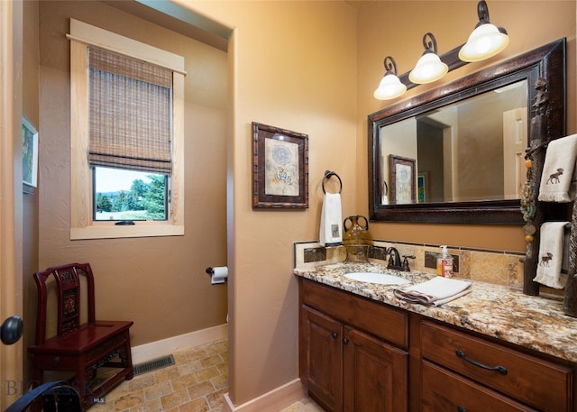 bathroom with vanity and tile patterned flooring