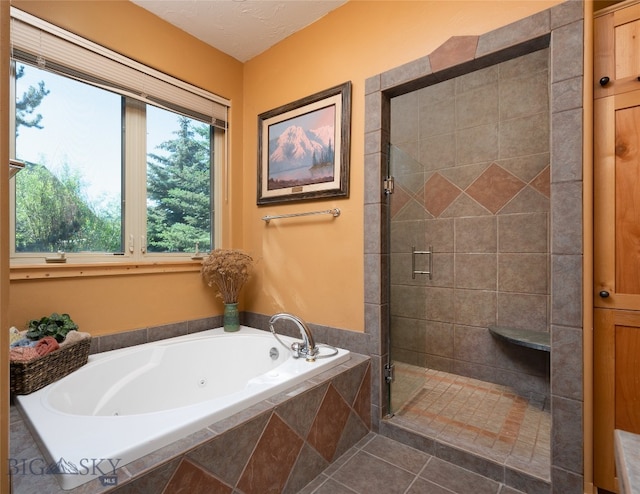 bathroom featuring shower with separate bathtub and tile patterned floors