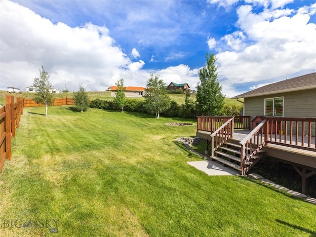 view of yard featuring a deck