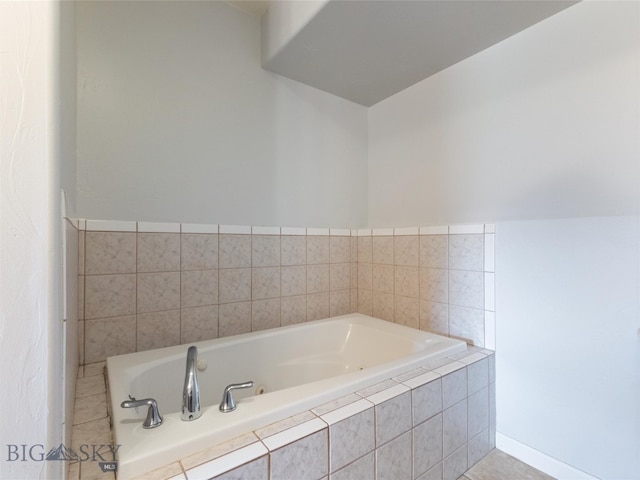 bathroom featuring tiled bath