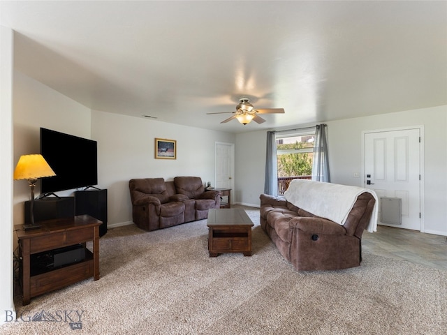 living room featuring ceiling fan and carpet floors