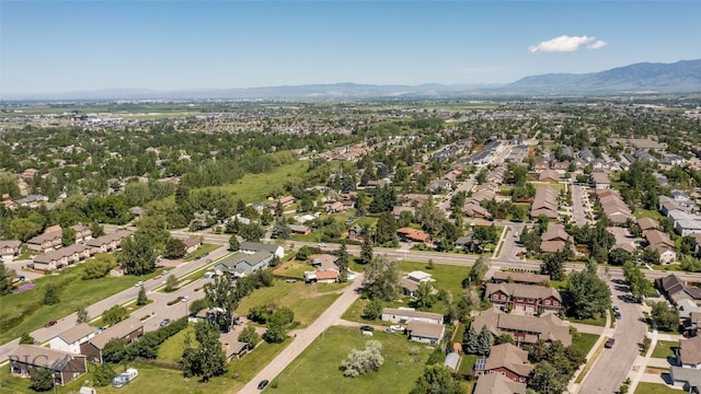 drone / aerial view featuring a mountain view