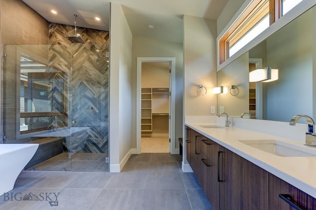 bathroom with vanity, separate shower and tub, and tile patterned flooring