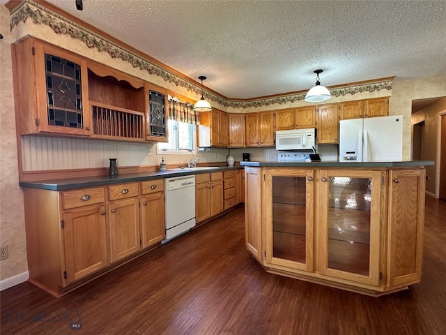 kitchen featuring a center island, white appliances, a textured ceiling, decorative light fixtures, and dark hardwood / wood-style flooring