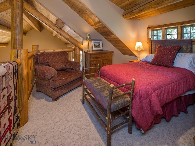 bedroom with vaulted ceiling with beams, carpet, and wooden ceiling