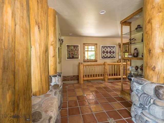 sitting room with dark tile patterned flooring