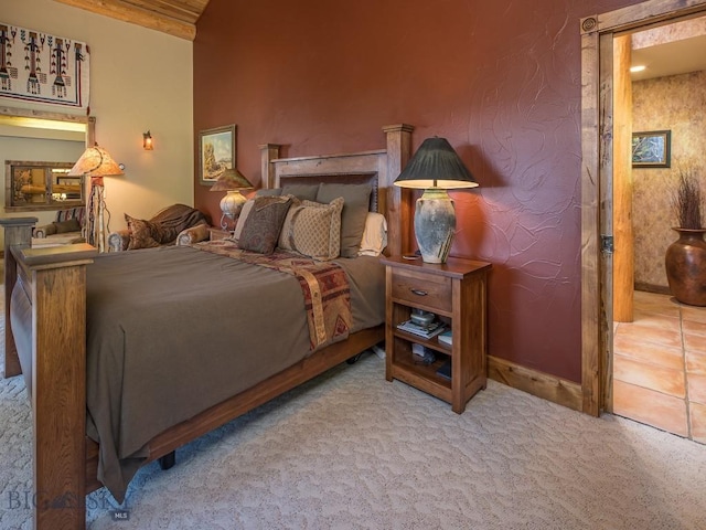 bedroom with light colored carpet