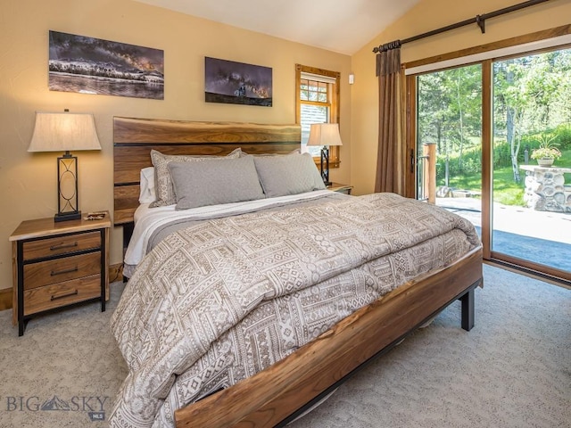 bedroom with light colored carpet, vaulted ceiling, and access to outside