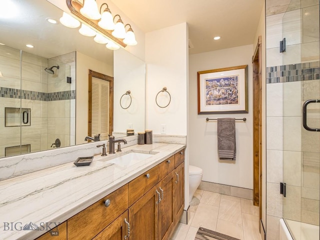 bathroom featuring vanity, toilet, an enclosed shower, and tile patterned flooring