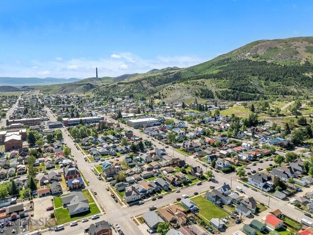 drone / aerial view featuring a mountain view