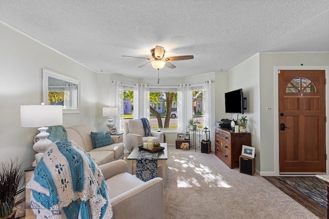 living room featuring crown molding, a textured ceiling, ceiling fan, and dark hardwood / wood-style flooring