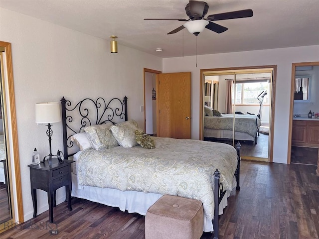bedroom featuring connected bathroom, dark hardwood / wood-style flooring, a closet, and ceiling fan