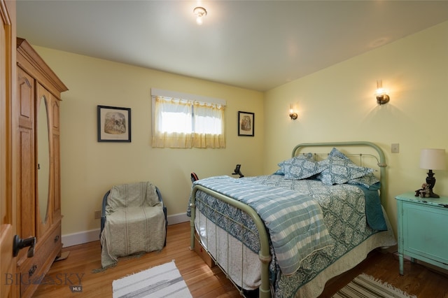 bedroom featuring light wood-type flooring