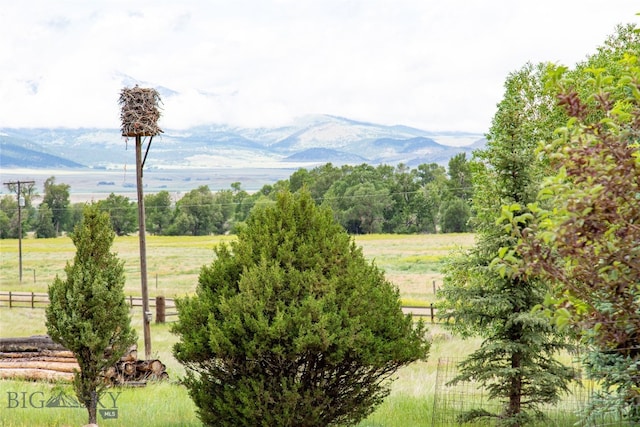 exterior space with a mountain view and a rural view