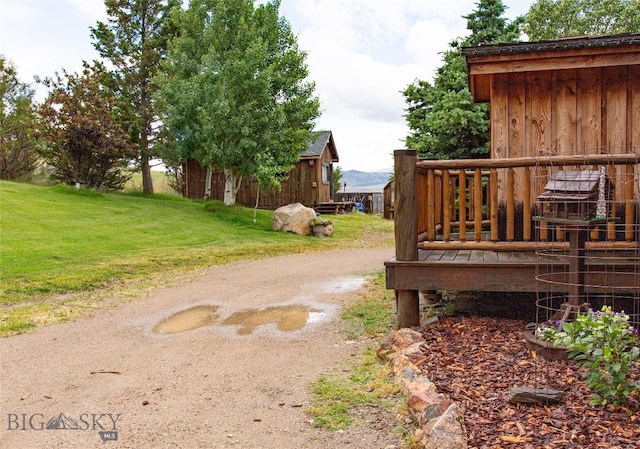 view of yard with a deck