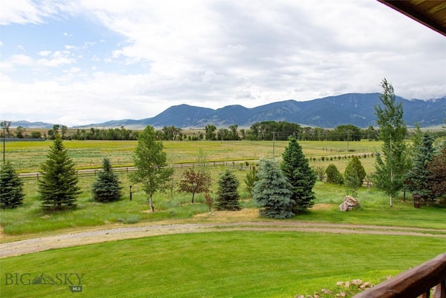 view of mountain feature featuring a rural view