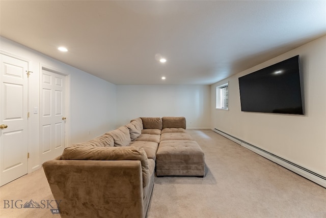 living room with a baseboard radiator and light colored carpet