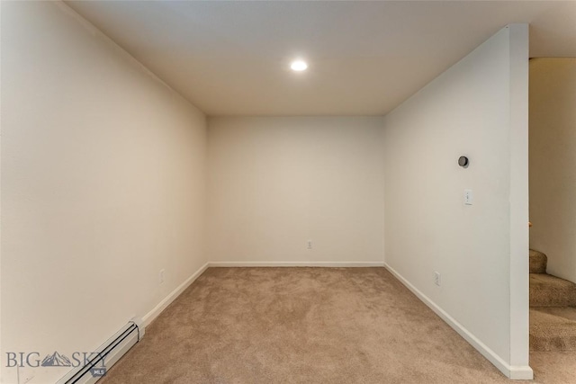 unfurnished room featuring recessed lighting, baseboards, a baseboard heating unit, and light carpet