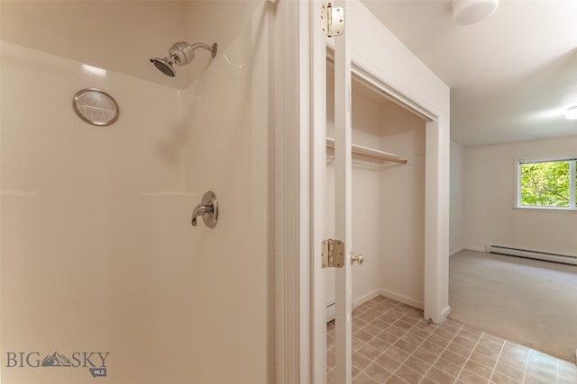 bathroom featuring a baseboard radiator and tile patterned flooring