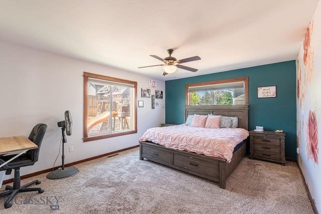 carpeted bedroom featuring ceiling fan