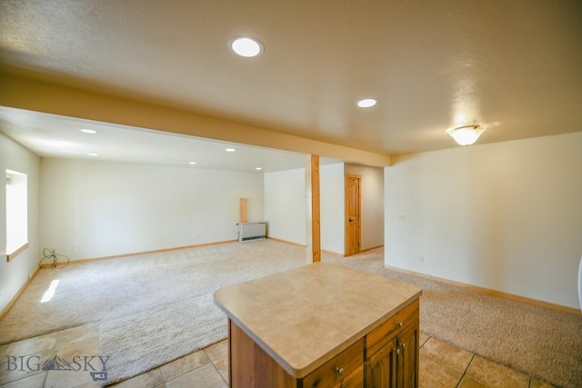 basement with light tile patterned flooring