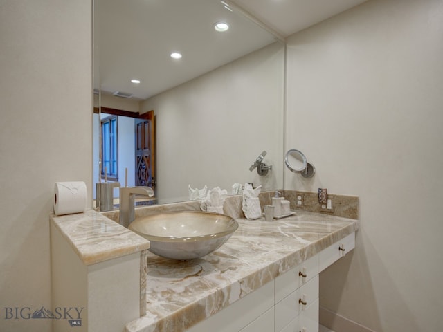 bathroom featuring vanity