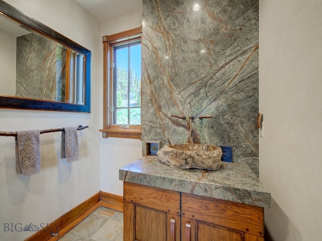 bathroom featuring vanity and tile patterned flooring