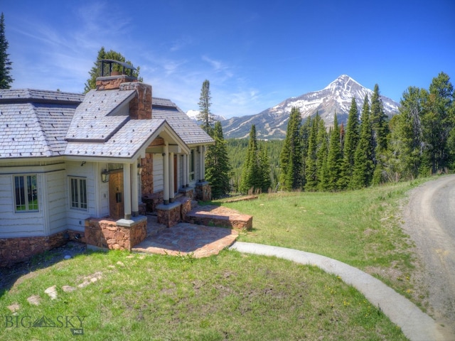 74 Upper Beehive Loop Rd, Big Sky, MT 59716 - view of yard with a mountain view