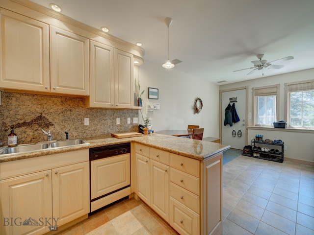 kitchen with light tile patterned flooring, tasteful backsplash, kitchen peninsula, dishwasher, and sink