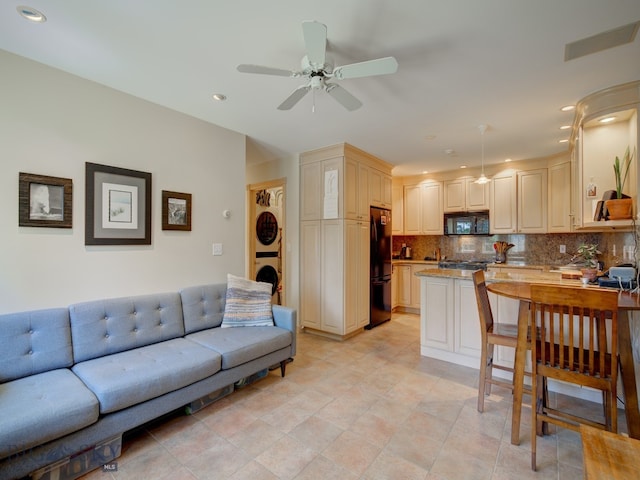 tiled living room featuring ceiling fan