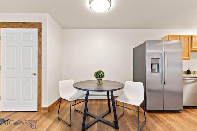 dining area featuring light hardwood / wood-style flooring