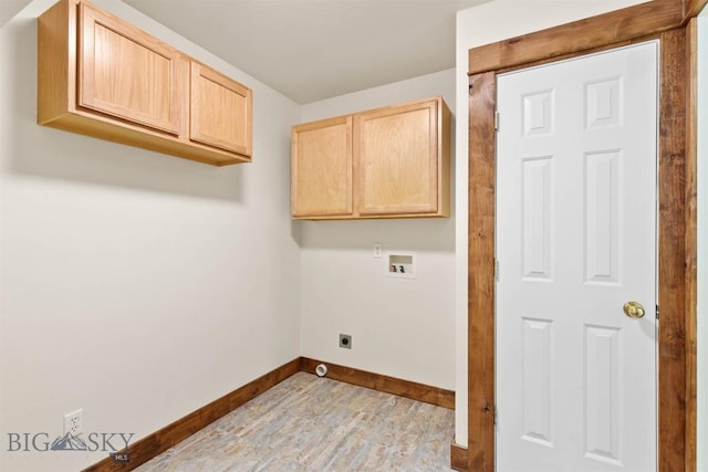 laundry room featuring cabinets, washer hookup, and electric dryer hookup