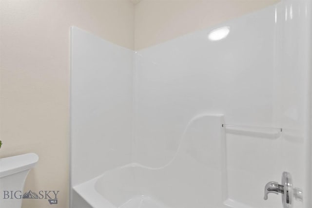 bathroom with  shower combination and toilet